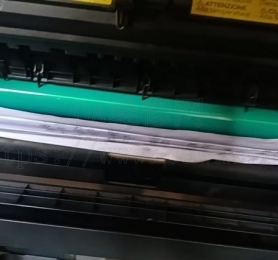 求柯美235打印机卡纸在对位上成扇形